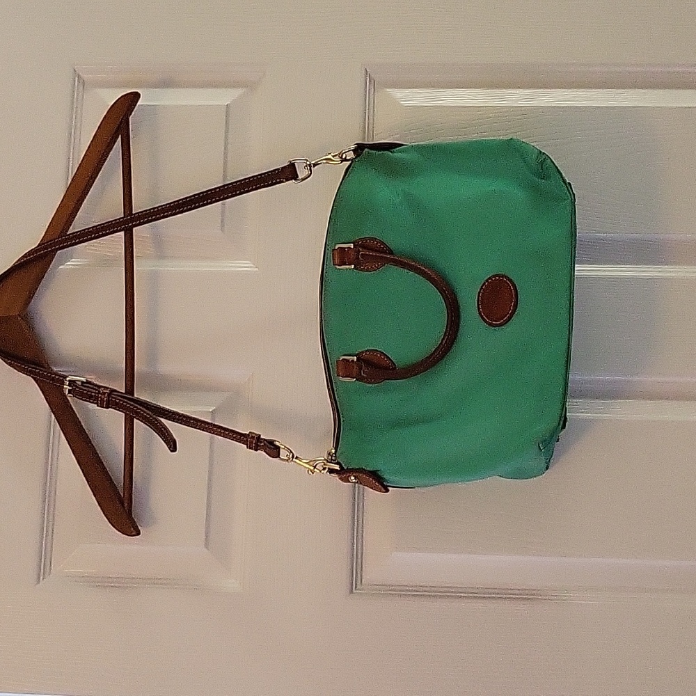 Dooney & Bourke bag.  Beautiful Green color. Good condition.